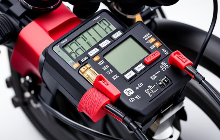 An image showing a close-up of a multimeter's red and black probes connecting to the positive and negative terminals of an electric bike's lithium-ion battery pack