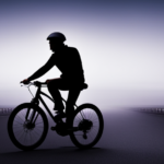 An image that depicts a person wearing a helmet, effortlessly flipping a switch on the handlebar of an electric bike, as a bright beam of light illuminates the road ahead, casting a warm glow onto the surroundings
