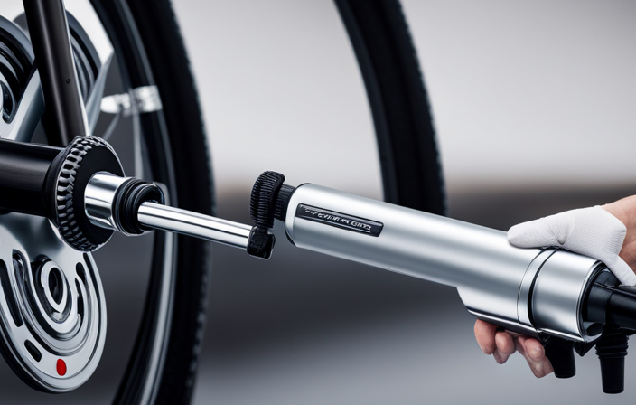 An image showcasing a close-up of a Mototec Electric Bike tire valve, with a hand holding a bicycle pump nozzle firmly pressed against it, ready to inflate the tire