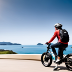 An image capturing a person wearing a helmet, with a confident smile, effortlessly gliding on an electric bike along a scenic coastal road