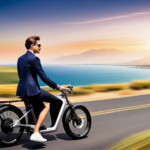An image showcasing a sleek electric bike gliding effortlessly along a scenic coastal road with wind-swept hair, as the rider effortlessly conquers both hilly terrains and urban streets
